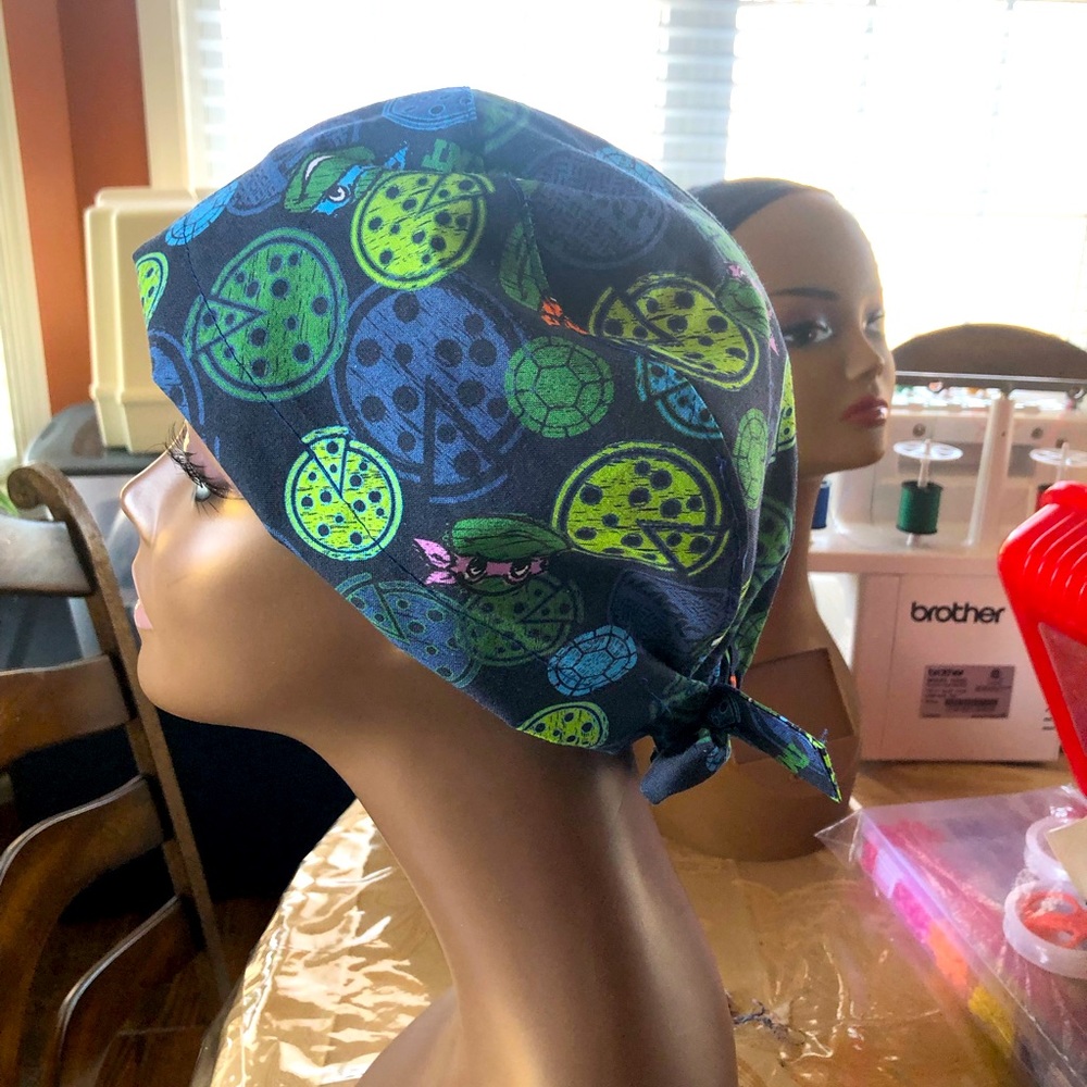 Ninja turtle design navy blue scrub cap.